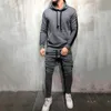 2 stycken sätter män Tracksuit New Höst Vinter Hooded Sweatshirt + Drawstring Pants Male Stripe Patchwork Hoodies