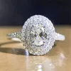 手作りの女性100％Soild 925スターリングシルバーリングオーバルカット0.6ct SONA 5A CZの婚約の結婚式のバンドリング女性ジュエリー