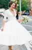 Abiti da sposa corti vintage anni '50 2019 Vendita su misura New ALine profondo scollo a V lunghezza tè mezza manica abiti da sposa in raso 9672268