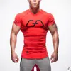 Mens sommar gym fitness bodybuilding t-shirt crossfit muskel manliga korta ärmar slim passform elasticitet skjortor snabba torra toppar