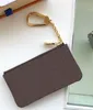 Damier braune Blume Leder Designer Blanded Männer Frauen Münze Erbsen Geldbörsen Reißverschluss kleine Mini süße kurze Kette Handtasche Leder Münzgeldbörse