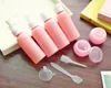 Hot 9PCS/Set Mini Makeup Refillable Travel Bottles Set Plastic Pressing Spray Bottle Makeup Tools Kit Face Cream Pot Bottles