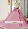 Prom babyrosa klänningar med stor båge tillbaka från axelpärlor formella klänningar spets applikation aftonklänning