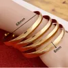 Braccialetti dei braccialetti delle donne all'ingrosso dei monili del braccialetto semplice del braccialetto rotondo normale del rame di colore dell'oro di grande formato di 8MM
