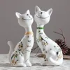 Europa moda lindo de cerámica gato de la suerte decoración del hogar artesanía decoración de la habitación objetos sonriente gato estatua de porcelana figuras de animales