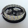 スーパーブライト12V 5M 2835 LEDフレキシブルストリップライトテープリボン300LEDS 600LEDS 1200LEDS 2400LEDSシングルダブルロウIP20 / IP67防水バックライト