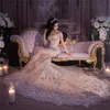 Lyx Arabisk Dubai High Neck Mermaid Bröllopsklänning Silver Beaded Långärmad Illusion Lace Applique Backless Court Tåg Bröllopsklänning