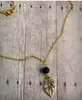 Nieuwe lava-rots lotus blad kruis hanger aromatherapie etherische olie diffuser kettingen natuurlijke zwarte lava kraal hanger ketting fijne sieraden