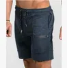 Pantalones cortos sueltos de nuevo diseñador para hombres, ropa fuerte hasta la rodilla para hombres, pantalones de gimnasia informales de verano de alta calidad para hombres