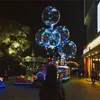 Leuchtender Bobo-Ballon mit Musikgriff, tragbarer LED-Blasenballon, zufällige Farbe, c223