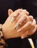 Melhores joias da moda europeia Bonito flor retrô libélula frisado strass ameixa cobra ouro prata anel dedo unhas anéis Brid243Q
