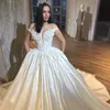 Dubai Princesa A-Line Vestido de Noiva Ver Através Jewel pescoço Pérolas frisados ​​Applique Vestidos de noiva elegante de cetim Trem da varredura vestidos de casamento