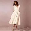 빈티지 1950 년대의 차 길이 웨딩 드레스 반 소매를 가진 짧은 웨딩 드레스 섹시한 V 목 상아 여름 해변 신부 가운