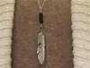 Vintage Lava-Rock Bead Feather / Leaves Tassel Lång halsband Aromaterapi Essential Oljediffusor Halsband Svart Lava Hängsmycke Smycken K2103