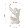 白い陶磁器の創造的な孔雀の花花瓶鍋の家の装飾工芸品部屋の結婚式の装飾工芸品磁器置物