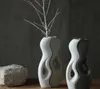Ceramica minimalista Arte creativa vaso di fiori secchi decorazioni per la casa artigianato camera decorazioni di nozze vasi fatti a mano figurine di porcellana
