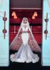 Luxuriöse Meerjungfrau-Hochzeitskleider mit langem Wickelumhang, Designer-Brautkleider mit V-Ausschnitt, Blumenapplikationen, Perlen, Dubai, maßgeschneidertes Hochzeitskleid