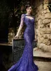 Rami Salamoun Eleganckie suknie wieczorowe Red Carpet Prom Dresses Real Image Syrenka Z Długim Rękawem Backless Koronki Cekiny Zroszony Korowód Sukienka