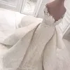 肩のビーズのレースのアップリケ結婚披露宴の礼拝堂の列車サウジーダーのウェディングドレスを誇るゴージャスなアラビア人魚のウェディングドレス
