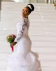 Afrykańska długie rękawy sukienka ślubna plus koronki rybakowy w rozmiarze Sheer szyi bodycon fishtail suknie ślubne z koralikami warstwą warstwa szlafropon