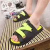 Stile Harajuku personalità della moda coreana pantofole selvagge sandali da spiaggia per studenti estivi maschili personalità sandali da coppia casual alla moda