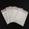 Förpackningspåsar Partihandel - Högkvalitativ Pearl Film Bubble Mailers Vit Padded Kuvert CE0004