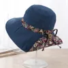 Kvinnor Mode Foldbar Beach Hat med Bowknot Sommarbredd Brim Print Blom Cap UV Protection Sun Hattar