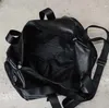 Duffel Bags Личные черные PU Женщины короткие ручки Большой Capactiy Travel Managing 36-55L