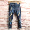 Heren Geschilderde jeans Afdrukken Denim broek Casual Modieuze potloodbroek Middentaille Kleurrijk