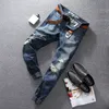Donkerblauwe kleur mode heren jeans topkwaliteit enkel banded vernietigd gescheurde jeans denim broek merk klassieke jogger mannen