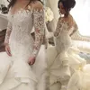 Cascading Ruches Tiered Trouwjurken Mode Zien door Hals Lange Mouw Bruidsjurken Kant Applicaties Backless Bridal Jurken Sexy