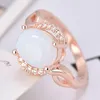 Пасхальный популярный стиль Moonstone Rose Gold Gemstone Austrian Crystal Пара Обручальные кольца для влюбленных четыре варианта