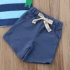 Karikaturdinosaurier-Babyjungen-Sommer kleidet blaues gestreiftes kurzes Hülsen T-Shirt + shorts 2pcs ein gesetzter beiläufiger Kinderjunge, der Butikenkleinkind kleidet