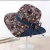 Cappello da spiaggia pieghevole moda donna con cappelli da sole con protezione UV a tesa larga estiva con stampa floreale Bowknot