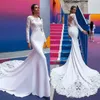 Abiti da sposa economici in pizzo a sirena maniche lunghe collo gioiello abiti da sposa bottoni sul retro tromba in raso Vestido De Novia