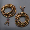 108 Тибетский буддийский Mala Natural Tiger Eye Gem Coney Beas Dual-Use Ожерелье Браслет Обернутая древесная молитва для медитации