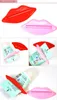 2Pcs Useful Cute Lip Shape Squeezer Dispenser Tool for Toothpaste Red Pink