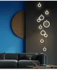 Le lustre contemporain de LED allume les droplighs menés nordiques anneaux acryliques éclairage d'escalier 3 5 6 7 10 anneaux luminaire intérieur 266v