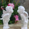 resina Amore Cupido piccolo Angelo statua decorazioni per la casa artigianato decorazione della stanza ornamento decorazione di nozze Fata figurine bambole per ragazze