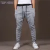 Casual Men Byxor Unik Big Pocket Hip Hop Harem Byxor Kvalitet Outwear Sweatpants Casual Mens Joggers Topp här Herrbyxor C18111201