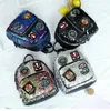 Moda Niñas Mochila Lentejuelas de dibujos animados Bordado Hombros Bolsas Adolescente Niños Mochilas escolares Niñas Ocio Bolsas de viaje Regalos de Navidad