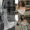 Liz Martinez Mermaid Wedding Dresses 2018 Off Shoulder Long Sleeve Lace Applique Beaded Bridal Gowns Elegant Sweep Train Wedding Dress