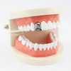 Hip Hop Single Tooth Grillz Tilt Diamonds Prawdziwe złote rapery dentystyczne grille fajne muzyczne biżuteria do ciała złota srebrna różowe złoto G8294562