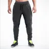 Calças masculinas Mens Bodybuilding Gym Workout Jogger Esporte Atlético Slim Fit Sweatpants Homens Chandal Hombre Wear Animal2340