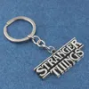 MOQ:10PCS SC Horror TV Series Stranger Things Letter Logo Keychains 3 Colors Letter Pendant Car Key Chain For Mean Jewelry Souvenir Gift
