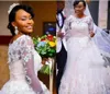 Plus Size 2020 Sheer manches longues dentelle robes de mariage Retour Boutons Une ligne Robes de mariée robes vintage africaine de mariage Robes Robes de Novia