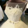 Fantaisie robe de bal robe de mariée ivoire robes de mariée haute qualité organza applique avec paillettes brillantes perles dos ouvert tribunal train robe de mariée