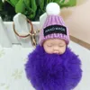 Sovande baby docka nyckelring pom-pom kanin päls boll nyckelring kvinnor nyckelhållare väska hänger modesmycken