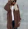 Mujeres de piel sintética chaquetas de piel exterior de invierno con capucha de terciopelo con capucha de invierno diseño de bolsillo diseño suelto mujeres ropa cálida suave tops
