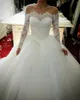 New Arrival Tiered Tulle Ball Gown Wedding Dresses Lace Beaded Crystals Long Sleeves Court Train Wedding Bridal Gowns For Bride258i